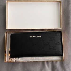 Black and gold Michael Kors wallet. Brand new